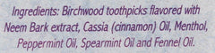 Close-up of neem-infused birchwood toothpicks