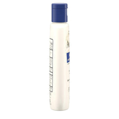 Aveeno lotion being applied to forearm demonstrates easy spreading for itchy skin.