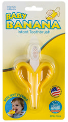 Toddler brushing with Baby Banana toothbrush