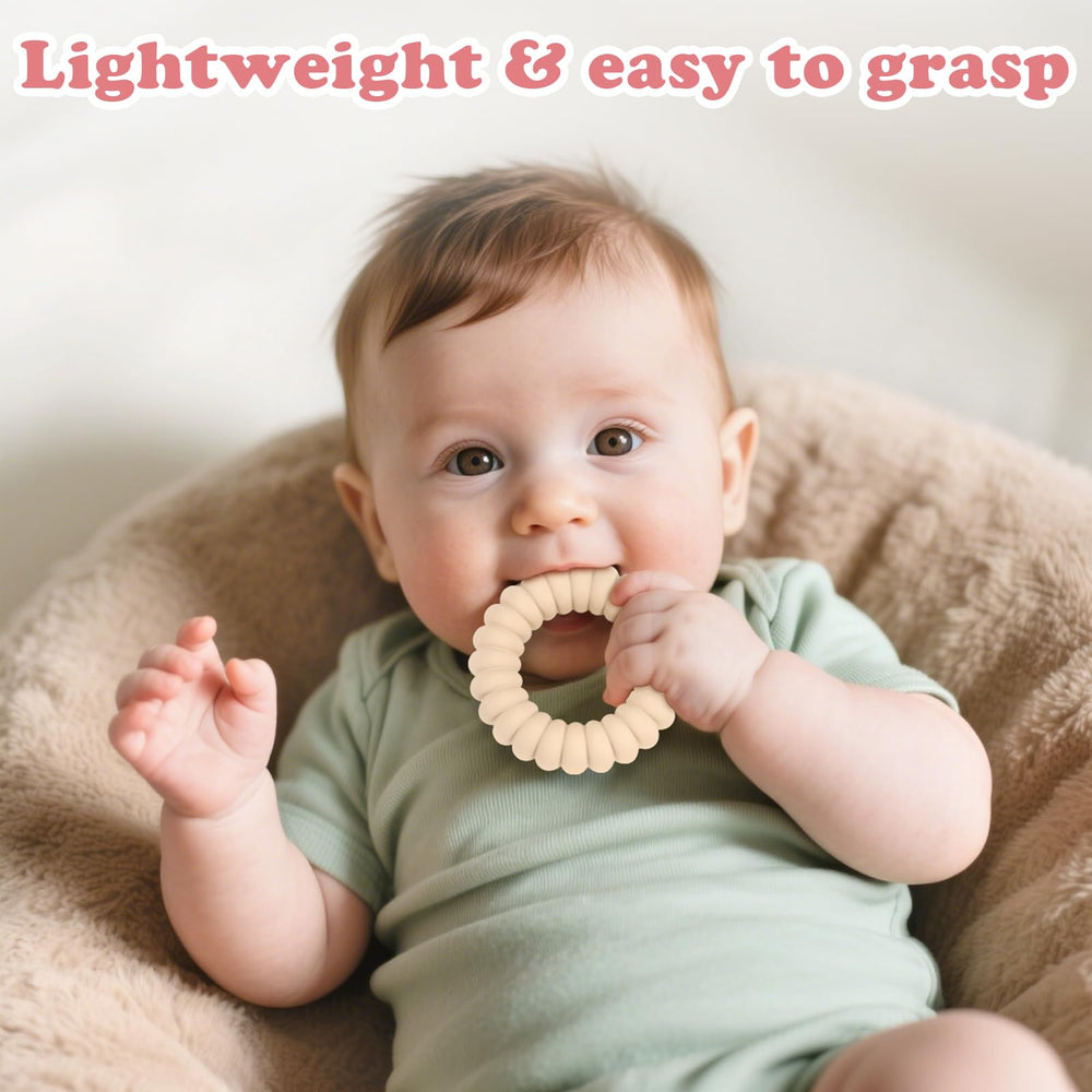 Multiple textured surfaces on silicone teether rings