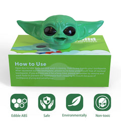 Baby Yoda toothpaste cap screwed onto toothpaste tube
