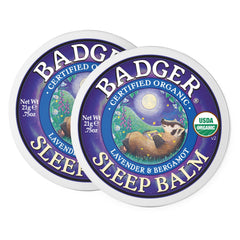 Badger Sleep Balm tin close-up showing natural texture and calming notes.