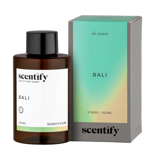 Bali aroma oil refill for diffusers featuring lemon, green, amber and woody notes in a 100ml bottle.