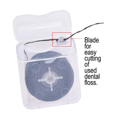 Mint-flavored bamboo charcoal dental floss on built-in spool