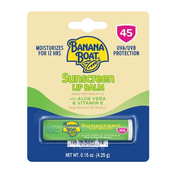 Banana Boat lip balm on hands in sunny light
