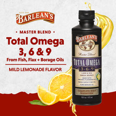 Pouring Barlean's Total Omega 3 6 9 into a glass for smoothies.