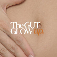 Scoop of Gut Glow powder next to product container