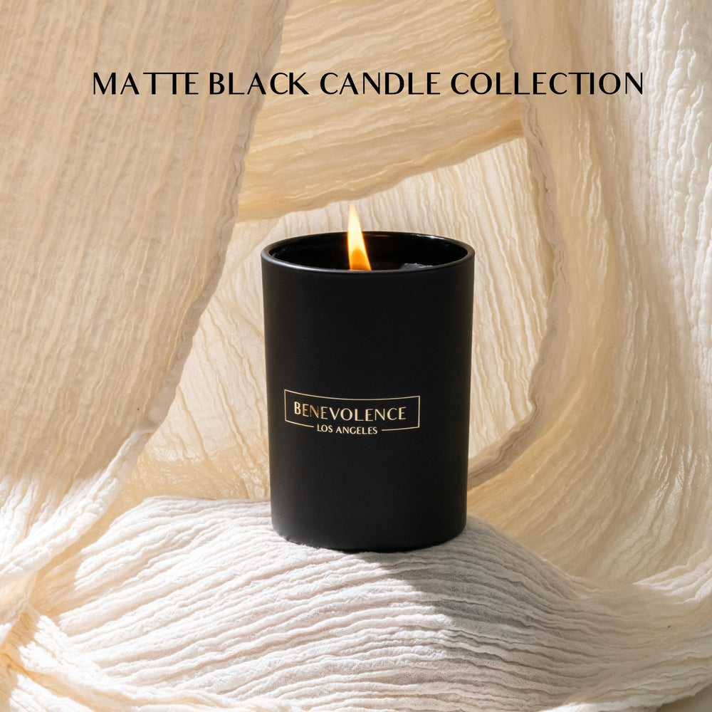 Close-up of black soy wax candle with cotton wick
