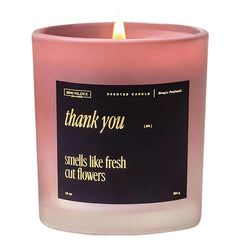 Close-up of Benevolence LA Thank You candle label