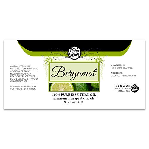 Natural bergamot essential oil bottle showing ingredients