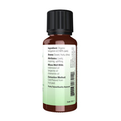 Bergamot essential oil dropper dispensing from bottle