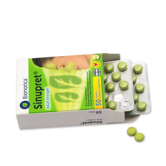 Sinupret tablets out of pack showing daily use dosing for symptoms