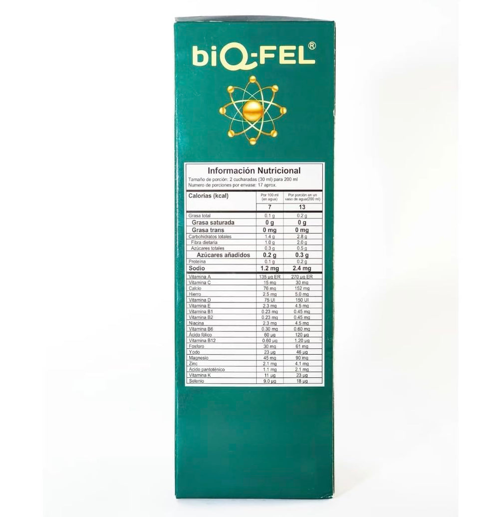 Liquid multivitamin being poured for dosing