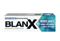 Close-up of stain removal action on BlanX Nordic White toothpaste