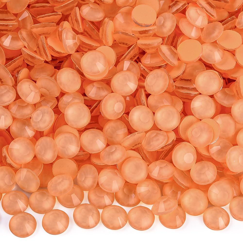 Blinginbox neon flatback rhinestones Living Coral glow for nails and crafts.