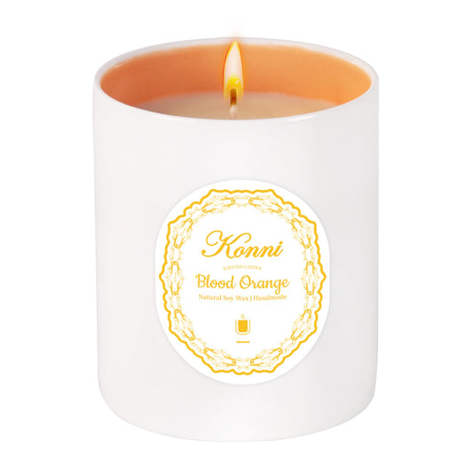 11oz blood orange scented candle in white and orange ceramic jar