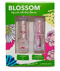 Blossom red color-changing lip balm hydrates lips with a strawberry aroma.