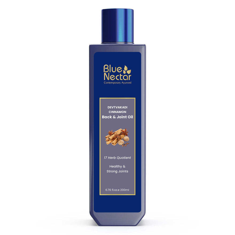 Blue Nectar Ayurvedic Pain Oil bottle with cinnamon and clove