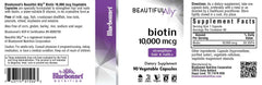 Close-up of Bluebonnet Beautiful Ally Biotin 10,000 mcg capsules and bottle