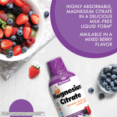 Mixed berry flavored liquid magnesium citrate bottle on white background