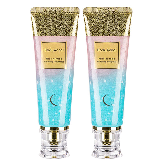 BodyAccel Niacinamide Whitening Toothpaste tube with mint leaves