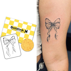 Boldink Bowknot 2 tattoo set on skin with a realistic, long-lasting look.