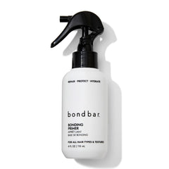 Bondbar Repair Treatment bottle close-up showing sulfate-free formula for damaged hair.