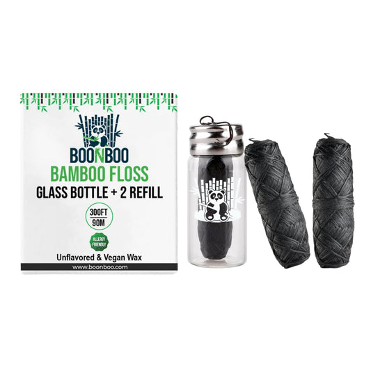 Charcoal woven dental floss with glass bottle - front view