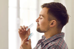 BOOYAH BLAST nasal stick pocket-usage scene enables instant wellness during workouts or commutes.