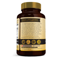 Bottle of Vivid Health Royal Jelly Bee Pollen Capsules on desk