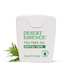 Box with six packs of Desert Essence tea tree dental tape displayed