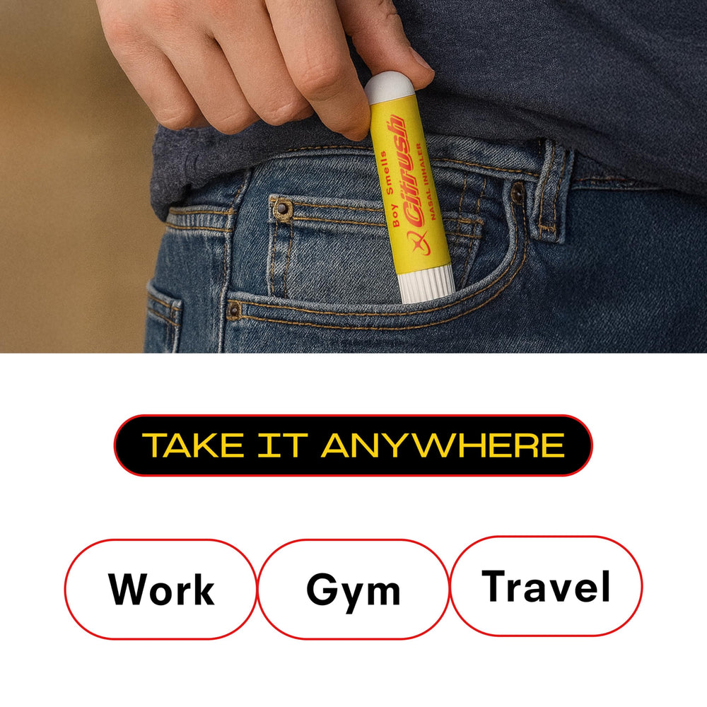 Person inhaling from the portable nasal stick