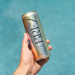 Lifestyle shot of BRĒZ Flow being enjoyed socially