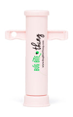 BUG BITE THING suction tool pink in hand for fast bite relief.