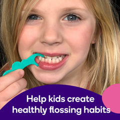 Colorful smiley-face floss picks in blue, green, and pink