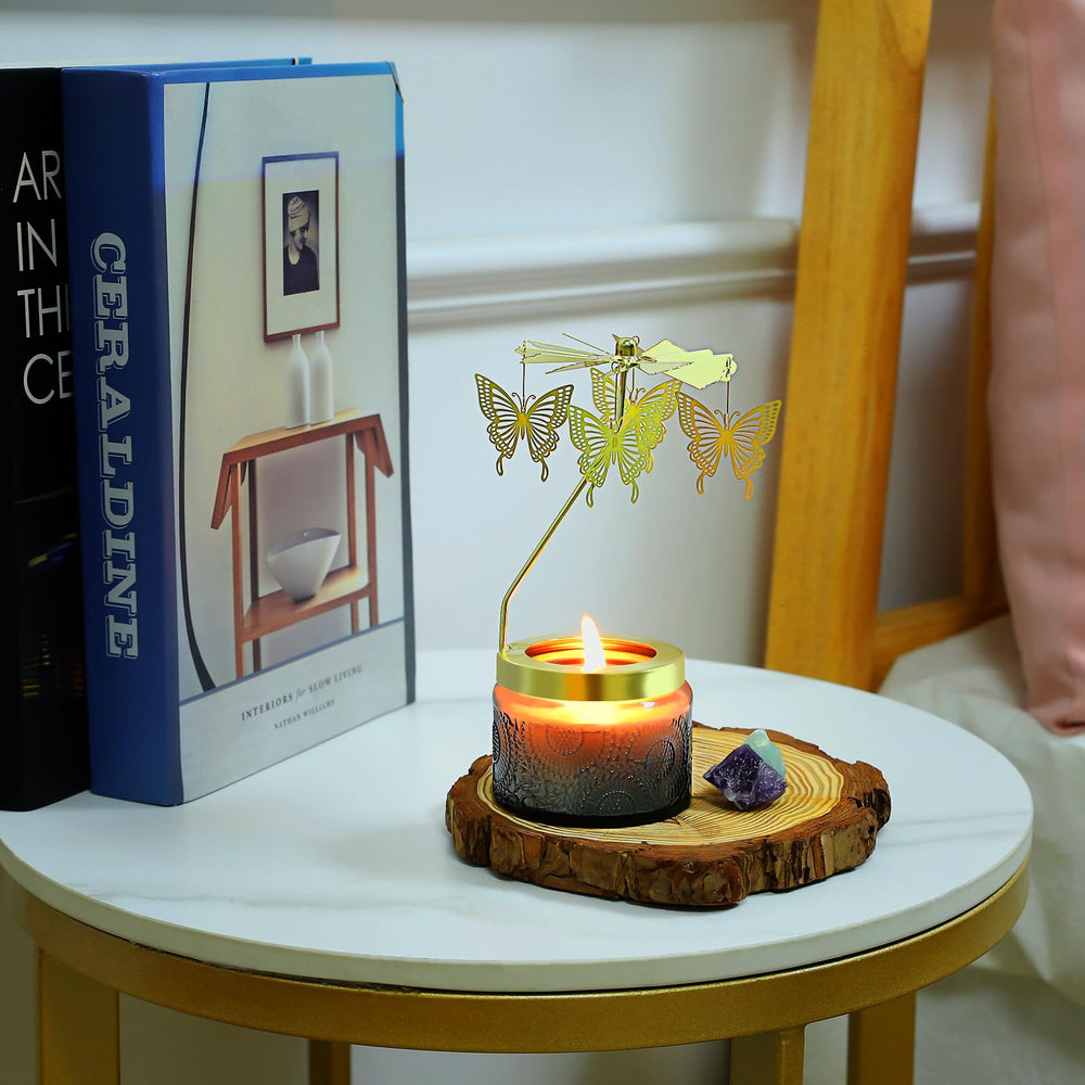 Close-up of rotating butterfly candle showing flame