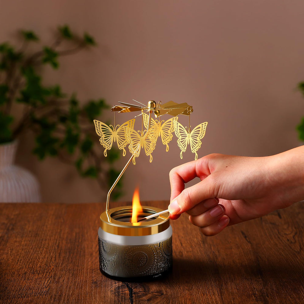 Gray butterfly candle on table with ambient lighting