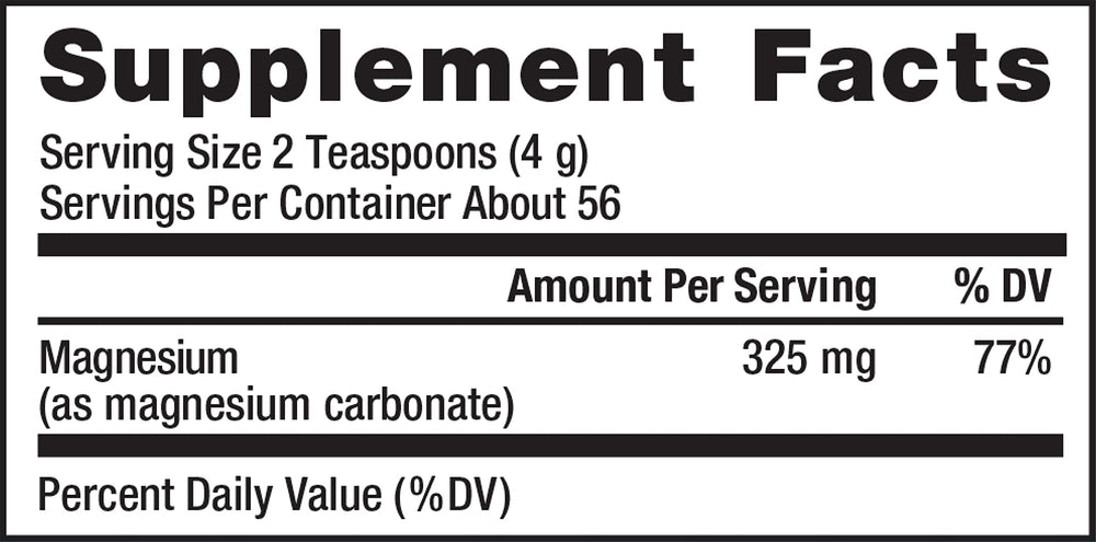 Glass of CALM magnesium drink with lemon flavor