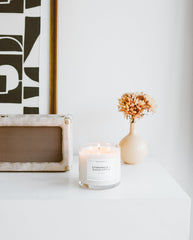 Living room scene featuring the evergreen eucalyptus 3-wick candle