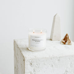 Room setting with Grapefruit & Flora candle for luxury ambiance