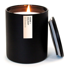 Calyan Wax Co home holiday candle in black 10.2oz tumbler - front view