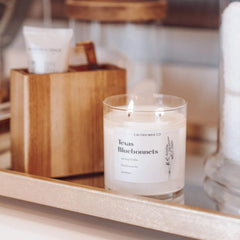Candle labeled as USA-made, vegan, and cruelty-free