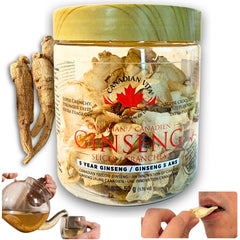 Golden dried Canadian ginseng root slices on white background
