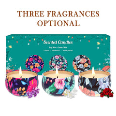 Side view of three-pack scented candles: cloves, roses and freesia