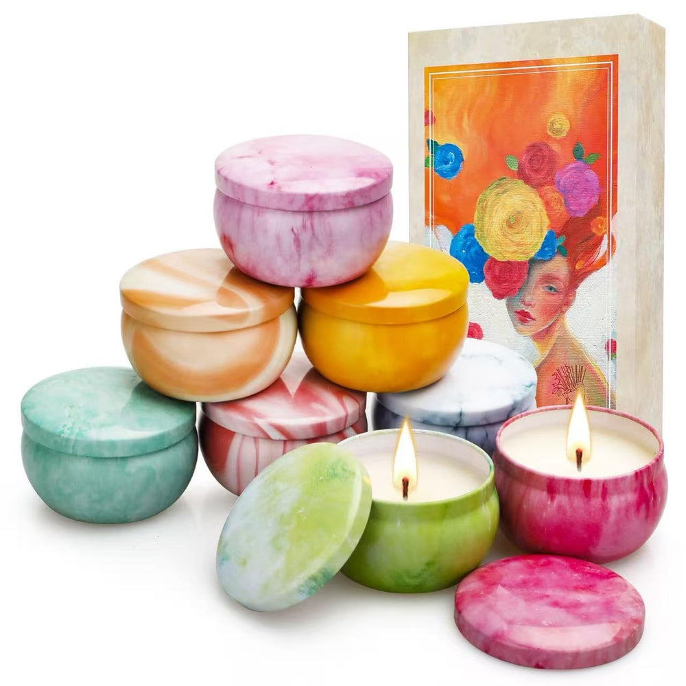Eight-pack candles in floral and fruity scents packaged as a holiday gift set