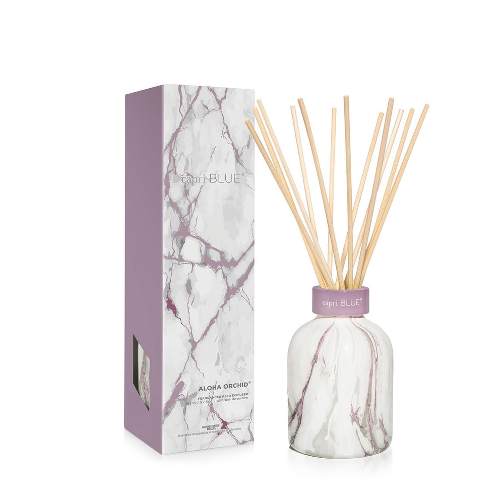 Capri Blue Modern Marble Reed Diffuser Set in Aloha Orchid with bottle and reeds