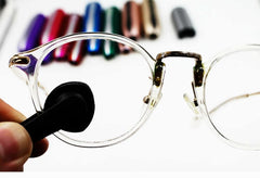 Peeps eyeglass cleaner in Space Gray with seven color options displayed