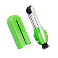 Peeps eyeglass cleaner in injected green color held next to glasses