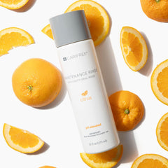 Lifestyle image of clean teeth with CariFree Maintenance Rinse Citrus