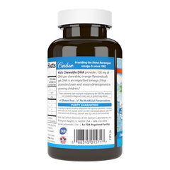 Group of orange DHA chewables on a white background